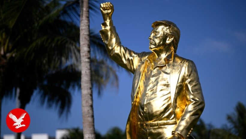 Trump phones into unveiling ceremony for a giant gold statue of himself at golf course