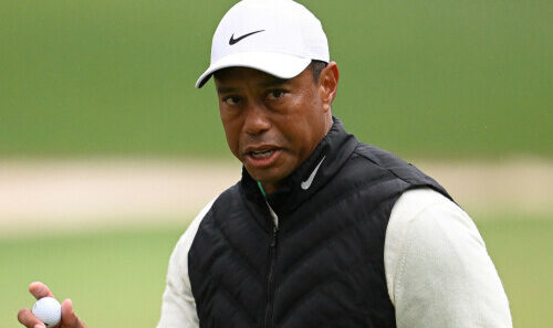 Tiger Woods ‘in good spirits’ after returning home from treatment programme