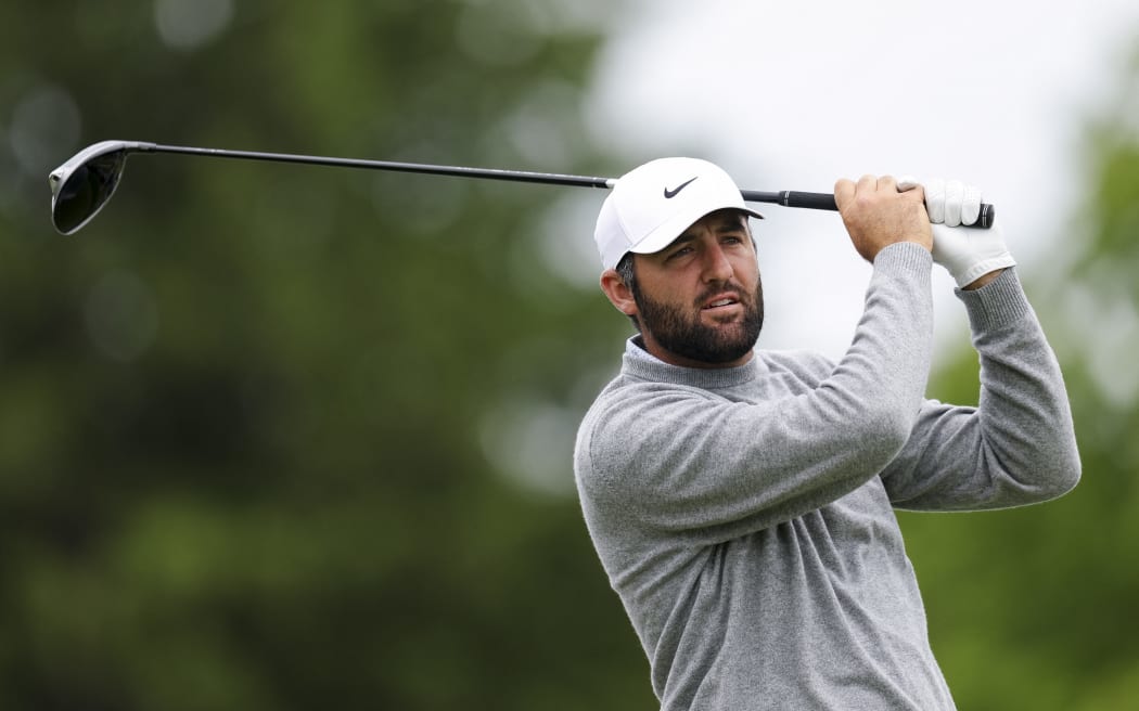 Scottie Scheffler plays a shot during a practice round ahead of this weekend's PGA Championship at Aronimink Golf Club, Newtown, Pennsylvania, May 11, 2026. (Photo by Emilee Chinn / GETTY IMAGES NORTH AMERICA / Getty Images via AFP)