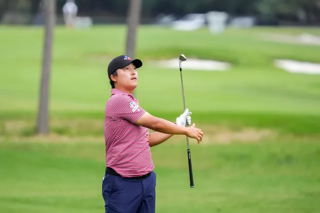 May 21, 2026; McKinney, Texas, USA; K.H. Lee plays a shot from the 12th fairway during the first round of THE CJ CUP Byron Nelson golf tournament. Mandatory Credit: Raymond Carlin III-Imagn Images