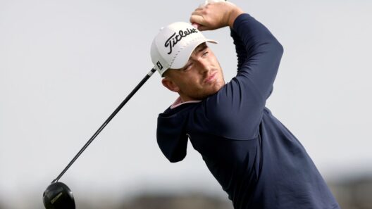 Keating tames Portrush winds to take North lead