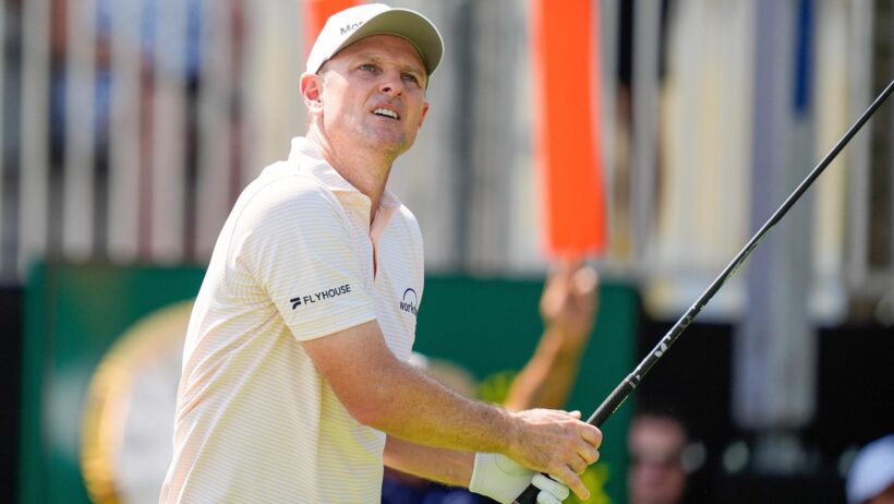 Apr 30, 2026; Miami, Florida, USA; Justin Rose watches his tee shot on the first hole during the first round of the Cadillac Championship golf tournament.