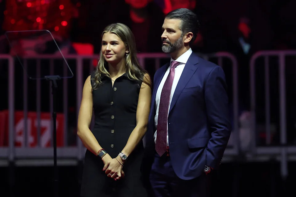 Donald Trump Jr. and his daughter Kai Madison Trump stand on stage at President-elect Donald Trump's victory rally at the Capital One Arena on Jan. 19, 2025 in Washington, DC.