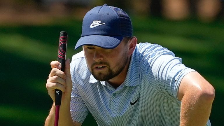 Alex Fitzpatrick, of England, lines up his putt on the fifth hole during the final round of the Truist Championship