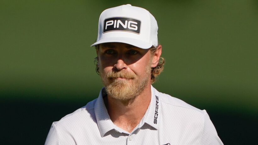 Kristoffer Reitan, of Norway, waves after a birdie on the 15th hole during the final round of the Truist Championship