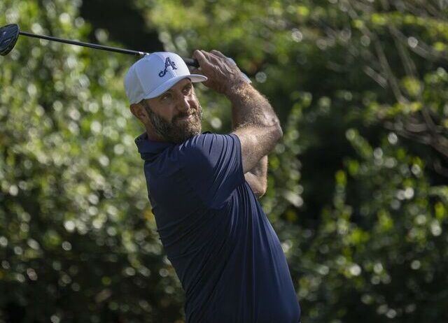 Masters champion Dustin Johnson of the United States plays a stroke from the No. 2 tee during the final round of the Masters at Augusta National Golf Club, Sunday, April 12, 2026.