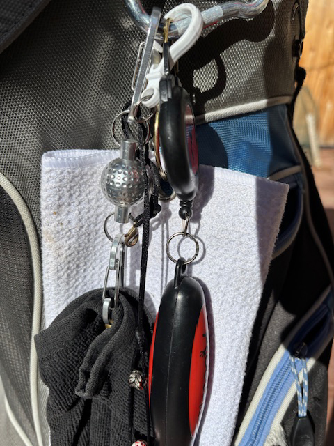 A magnetic clip for your golf towel is the accessory you didn't know you needed. (Barbara Ellis, The Denver Post)