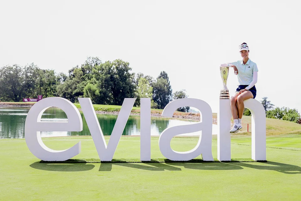 Australia's Grace Kim poses with the trophy after her victory on the first playoff hole after the final round of the Amundi Evian Championship at Evian Resort Golf Club, in Evian-Les-Bains, eastern France on July 13, 2025.