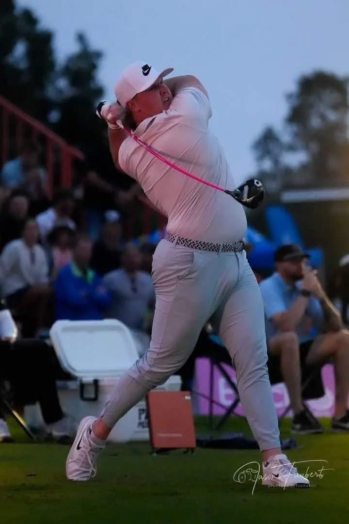 Former Roncalli high school boys golfer Logan Schott swings his club during a long drive event in 2026.