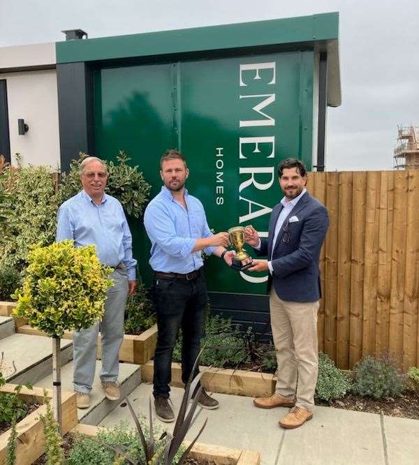 Presentation of the Brian Saville Cup by George Brown of Emerald Homes and Peter Jullien from Spalding RFC to Eddy Pentney on behalf of winners Stephan Fox and Ben Fowler.