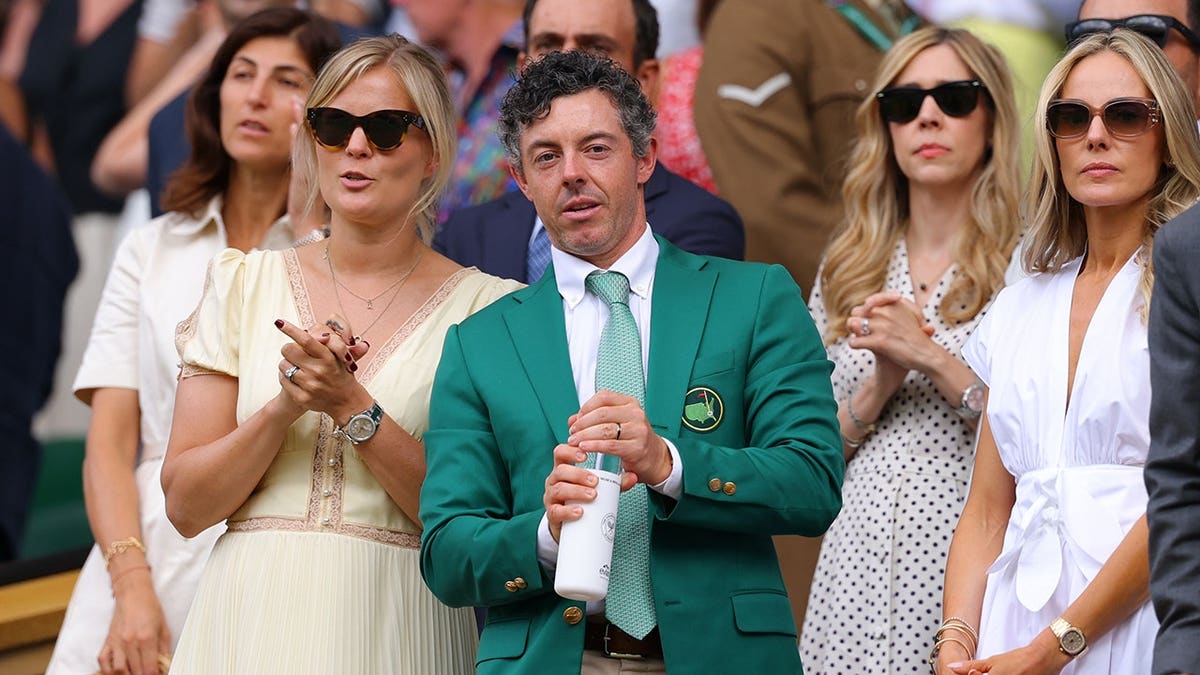 Rory McIlroy watches from Wimbledon Center Court