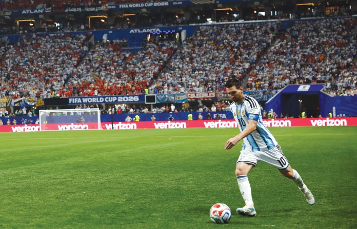 Argentina’s Lionel Messi takes a free kick during a World Cup match. (Odd ANDERSEN/AFP via Getty Images)