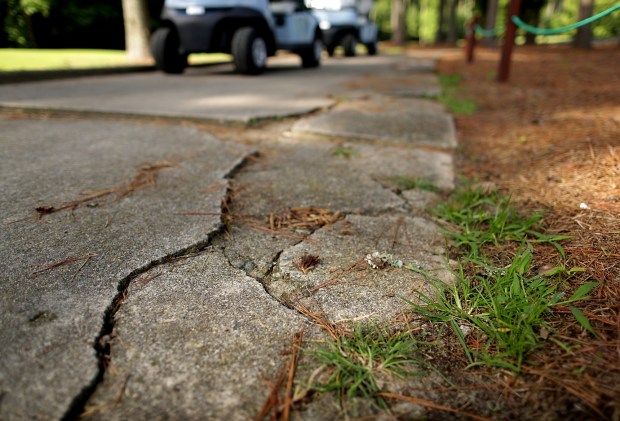 Among the improvements needed at the Virginia Beach National Golf Club is significant repairs to the cart path. As seen Thursday, August 6, 2026. (Stephen M. Katz / The Virginian-Pilot)