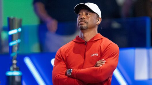 Tiger Woods of Jupiter Links GC watches his team against Boston Common Golf during TGL match at SoFi Center on March 17, 2026,
