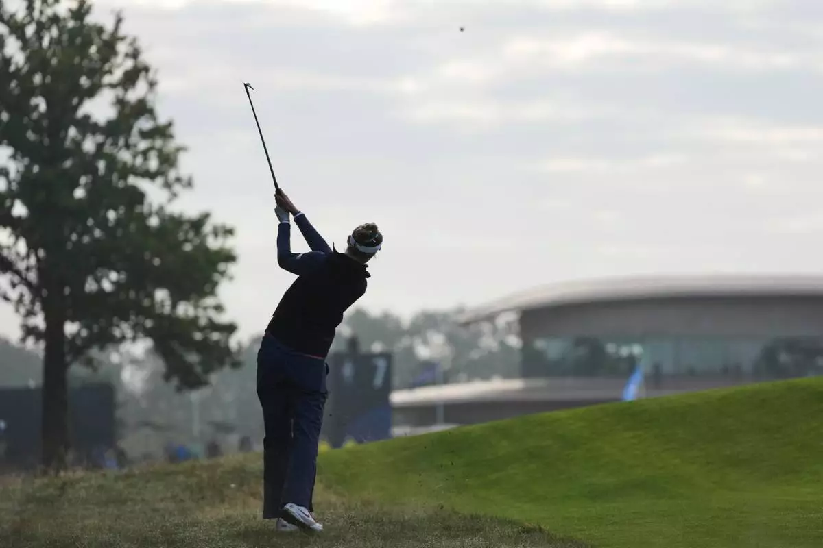 Nelly Korda of the United States watches her shot to the seventh green during the Solheim Cup at the Bernardus Golf course in Den Bosch, Netherlands, Saturday, Sept. 12, 2026. (AP Photo/Alastair Grant)