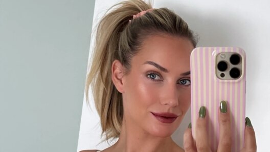 Paige Spiranac puts on delightful busty display in stunning yellow crop top as golf influencer flashes toned midriff