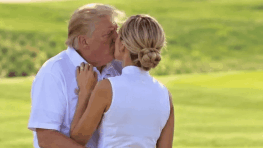 Truth behind image of Donald Trump kissing assistant on golf course